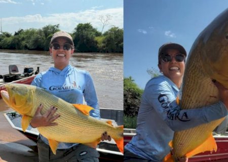 Achei a barra de ouro': empresária fisga peixe dourado gigante de 18 kg em rio de Mato Grosso do Sul